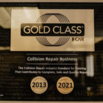 Photo of an I-Car Gold Class certification in a collision repair shop.